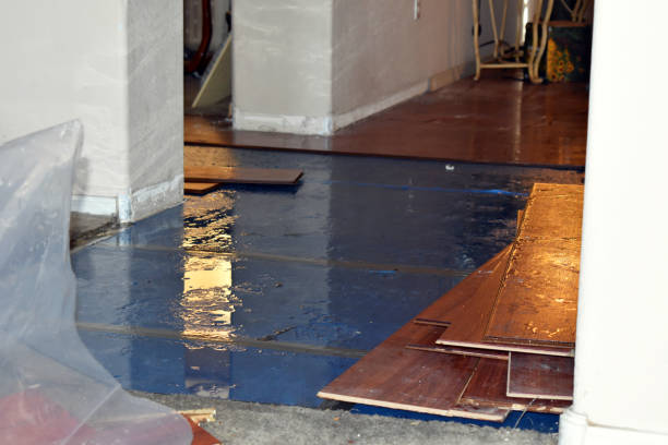 Professional Flood Damage Restoration technician working in Portage, WI